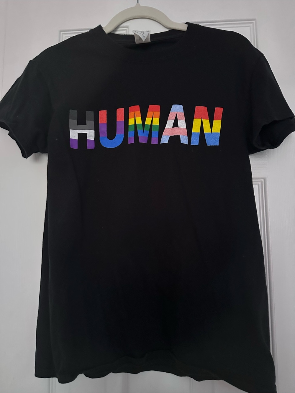 RAGA Black Tee with Rainbow 'HUMAN' Graphic